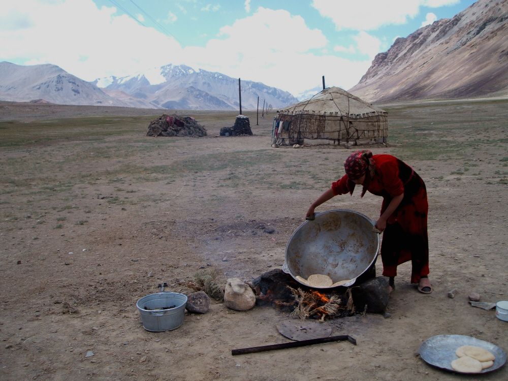 Tajik woman making bread