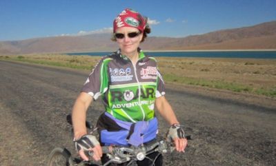 Corina Naughton Cycling on the  tour with redspokes
